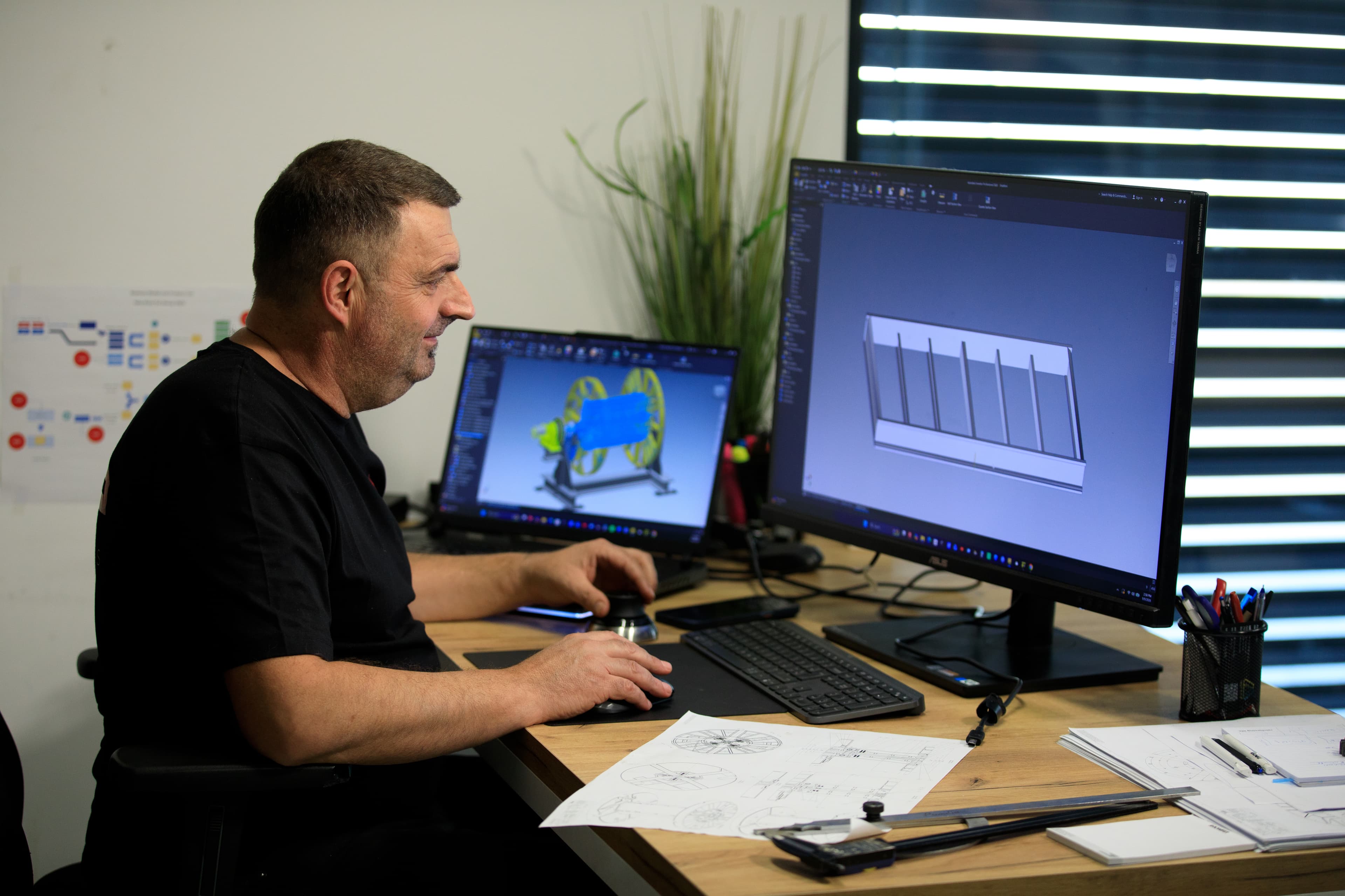 Engineer reviewing a prototype design